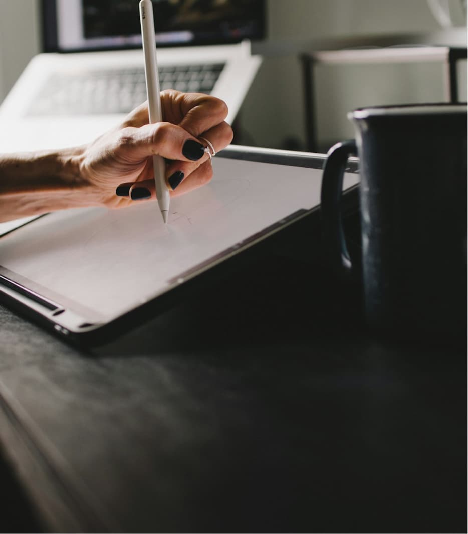 Person giving presentation on whiteboard.